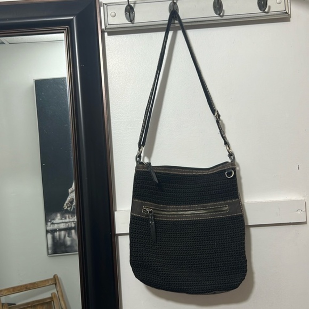 The Sak black crocheted style purse with canvas trim Excellent condition